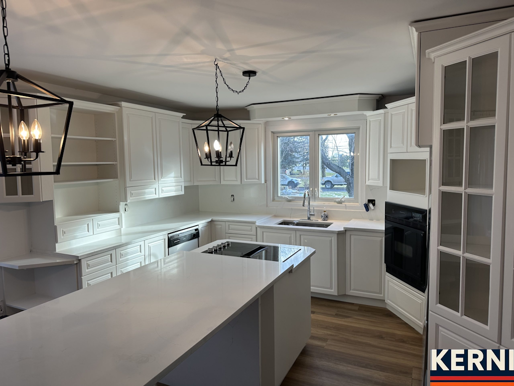 After: flawless spray painted finish on an Alberta home exterior by KERNI PAINT