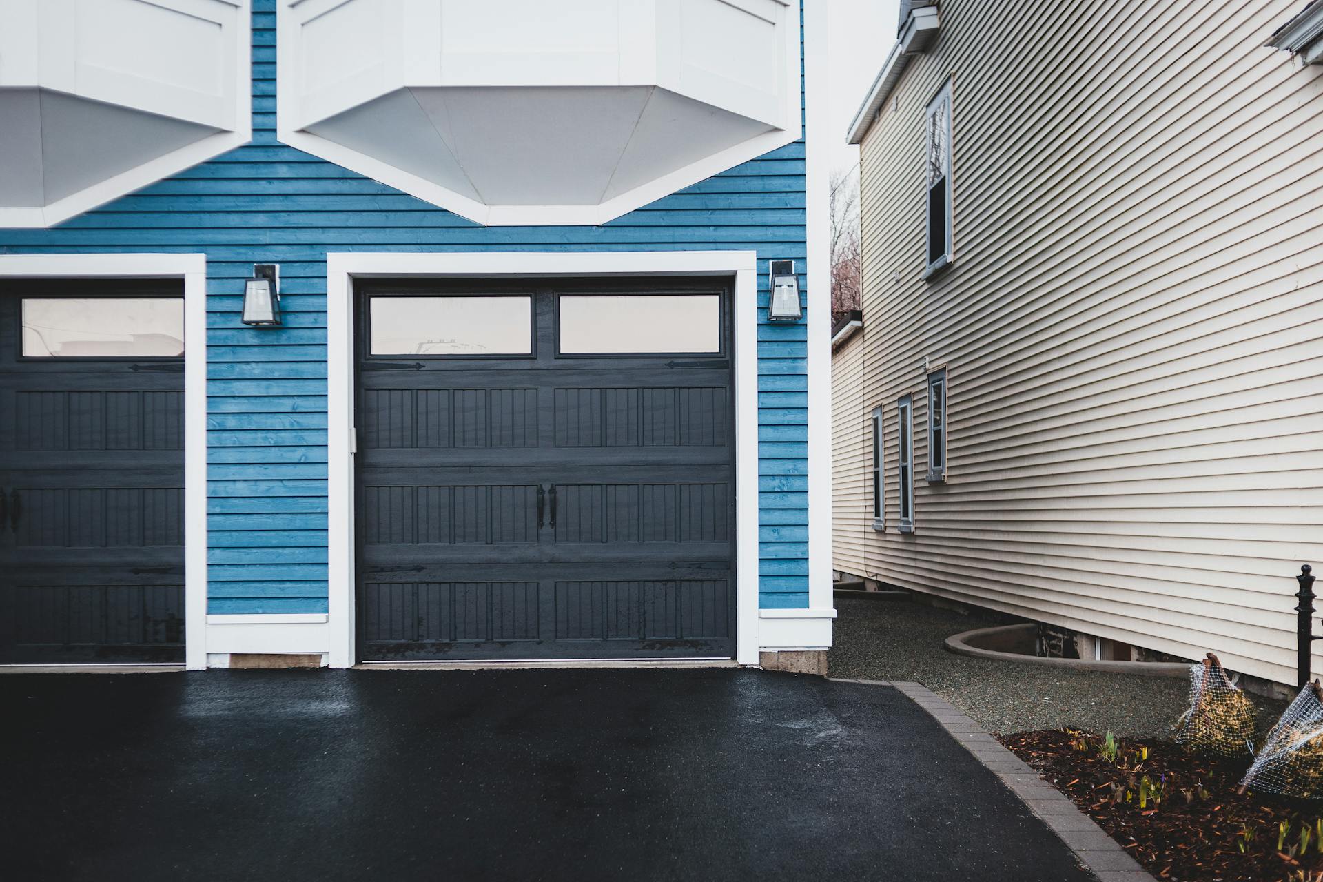 Residential home with freshly painted garage doors
